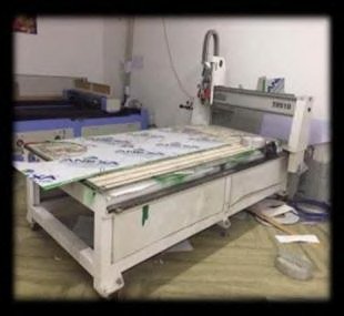 CNC router bed for cutting 3D letterforms and signage components